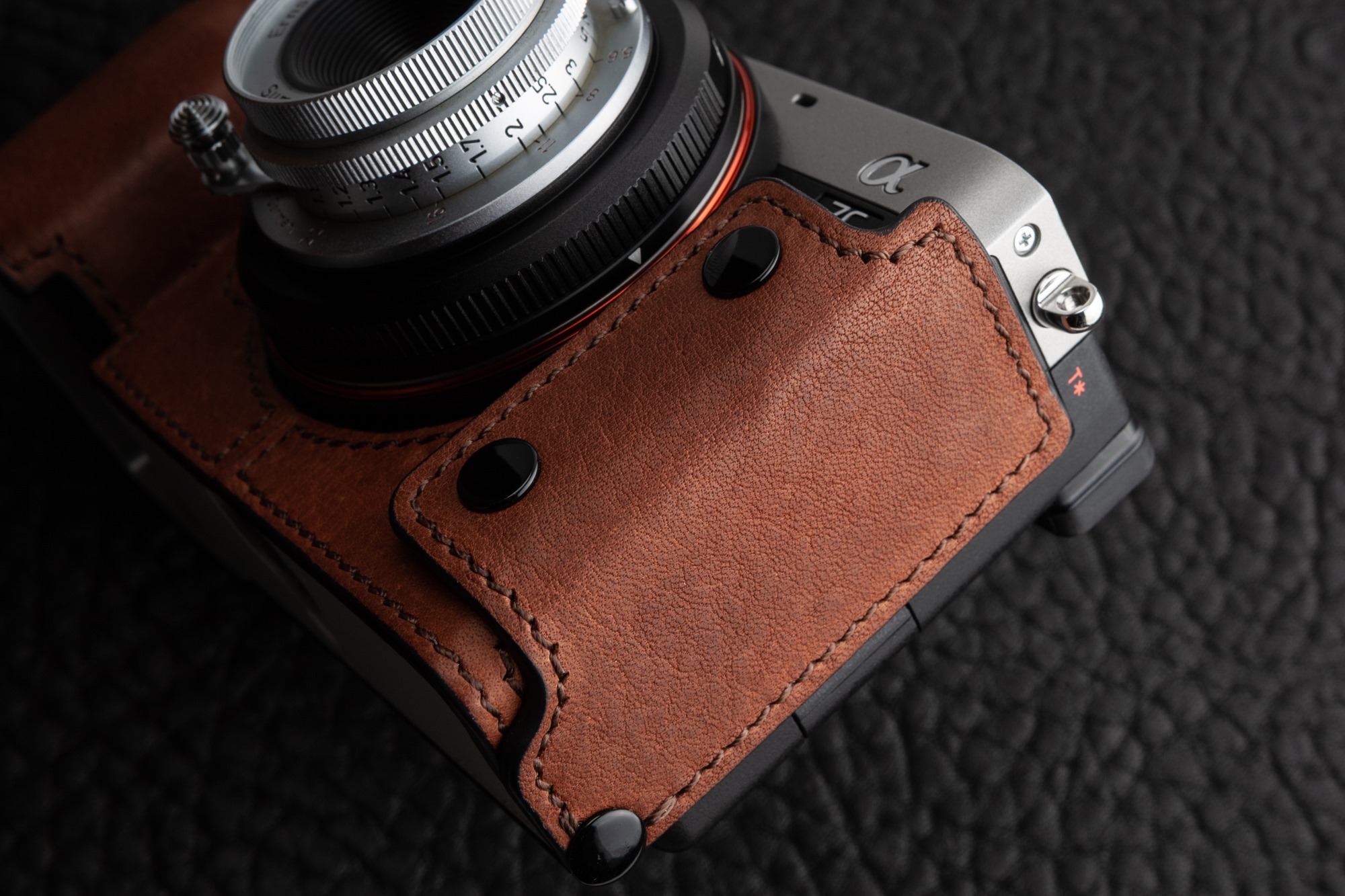 Nice images of the Sony A7c with leather case | sonyalpharumors
